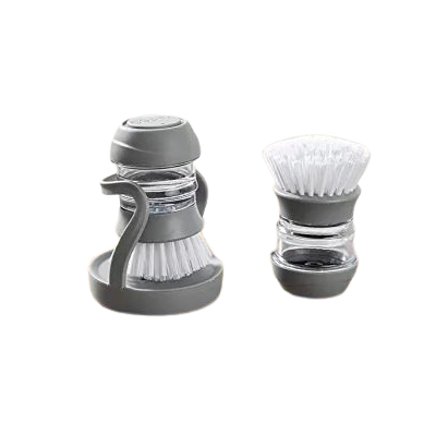 Cepillo de limpieza con dispensador de jabón