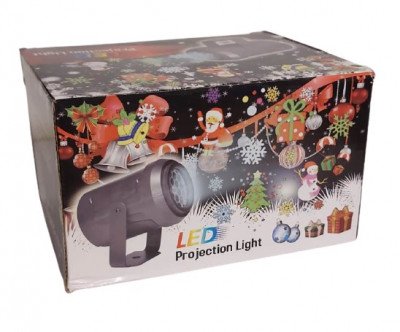 Proyector de luces con dibujos de navidad. JIE - 51608